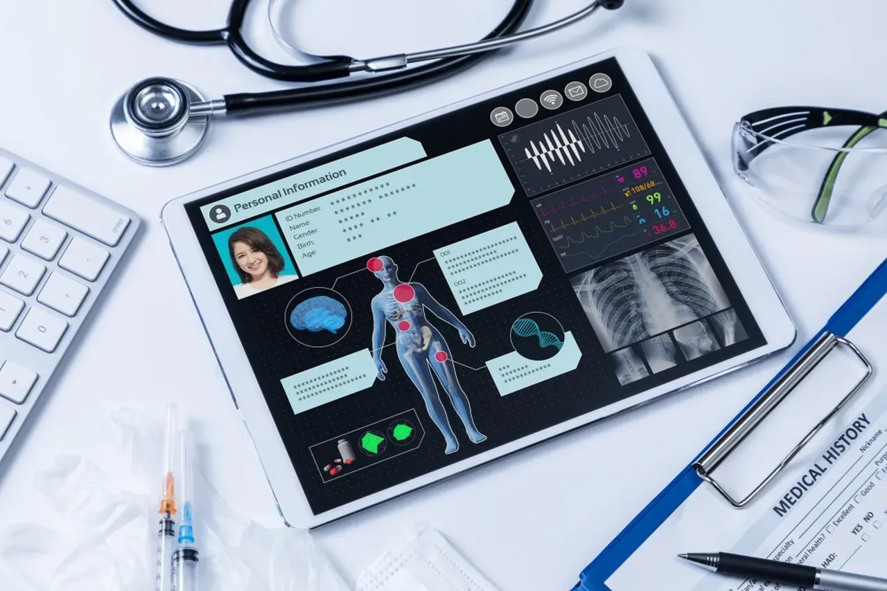 Patient using remote blood pressure monitor at home